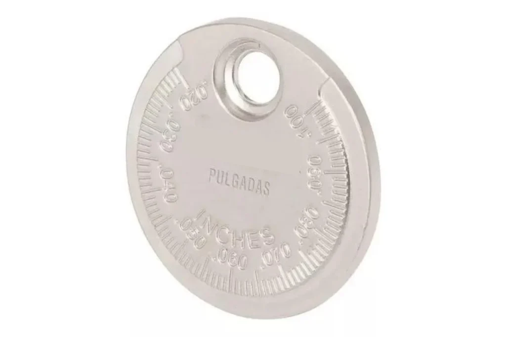 Calibrador de moneda para bujías